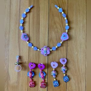 Vintage Polly pocket jewelry set. 2 sets of clip on earrings,a necklace & ring